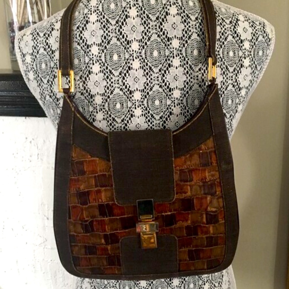 Stuart Weitzman 90’s leather and canvas with metal clasp and strap details purse